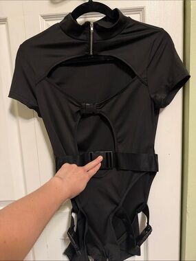 Black One-Piece Bodysuit with Front Cutout and Buckle